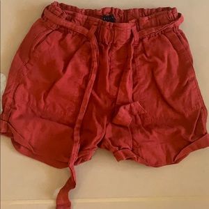 Burnt orange flowy cargo shorts